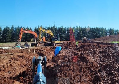 Excavators digging. Landmark Construction PEI earth moving and digging services.